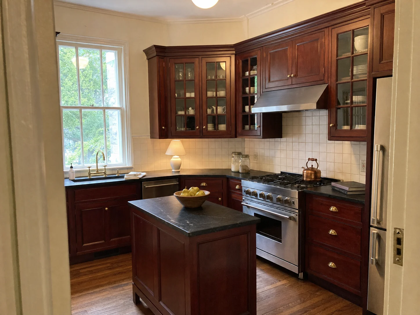 Traditional cherry kitchen with glass-front cabinets before cabinet painting in Kalorama, Washington DC